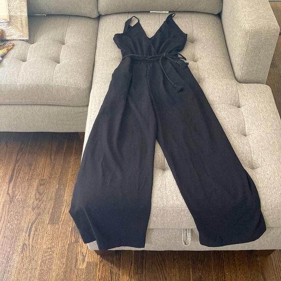 Black full length jumpsuit. NEW/NEVER WORN - Picture 1 of 3